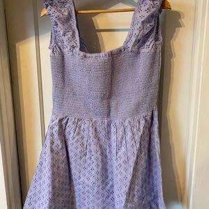 Woman Smocked Eyelet Flutter Sleeve Dress in Soft Purple